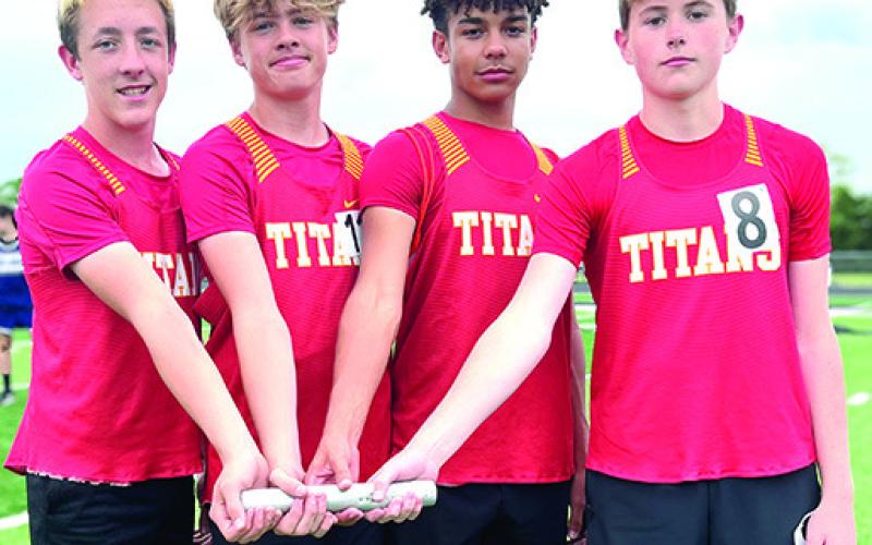The Columbus Titan Eighth Grade 4x800 Meter Relay Team set a new school record at the Girard Invitational Track and Field Meet, April 17. Team members Denver Hughes, Paxton Schalk, Jayden Dohle, and Jex Cheney completed the race with a time of 10:32.9 minutes beating the 1998 record of 10:52 minutes set by Matt Case, Jeremy Moss, Jake Mooney, and Emry McReynolds. Courtesy photo.