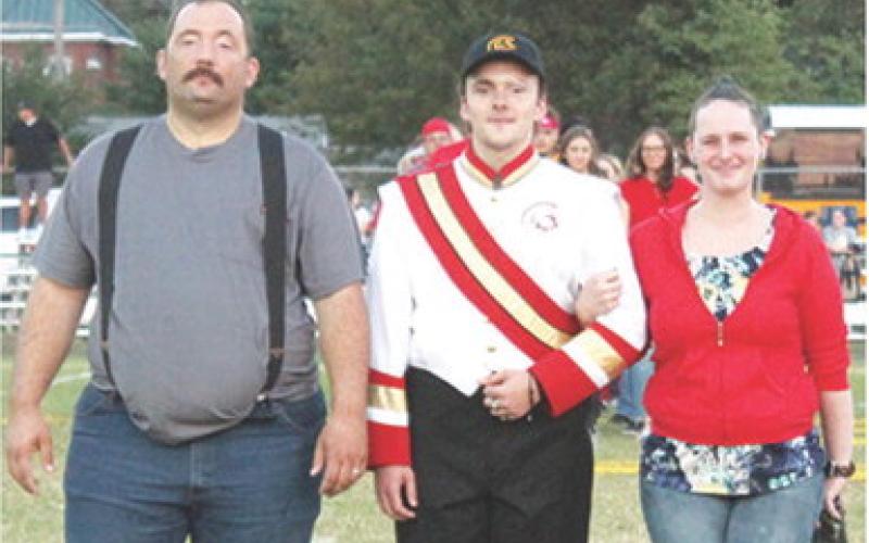 Senior, Gabe Edwards, was recognized during Senior Night Ceremonies at Titan Stadium, October 17. Gabe is a four-year member of the Titan Band. He was escorted by his parents Matthew Edwards and Sarah Sattazahn.