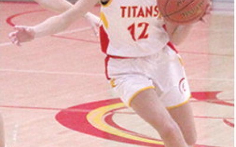 Halle Gray, Columbus Eighth Grader, dribbles, during the 29-6, Lady Titan loss to Frontenac, Tuesday, at the Central Gym. Halle had four points in the loss.