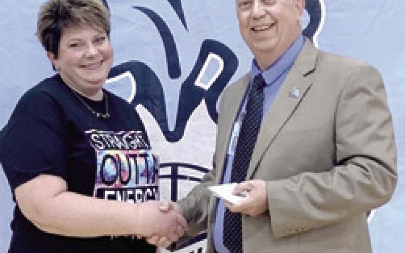 Natalie Collins was recognized for 20 years of service with the Southeast school district by Superintendent Dr. Brad Miner.