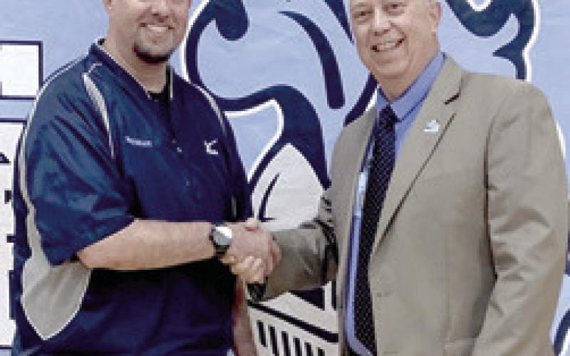 Brad Coots was recognized for 20 years of service with the Southeast school district by Superintendent Dr. Brad Miner.