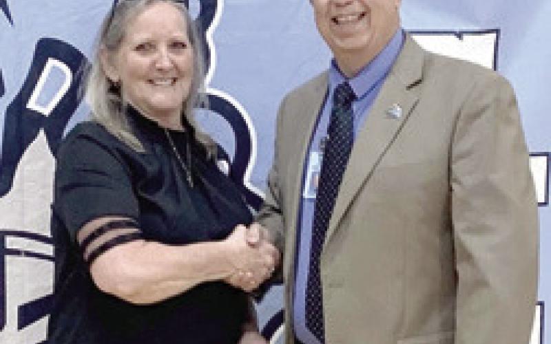 Rita Mitchell was recognized for 15 year of service with the Southeast school district by Superintendent Dr. Brad Miner.