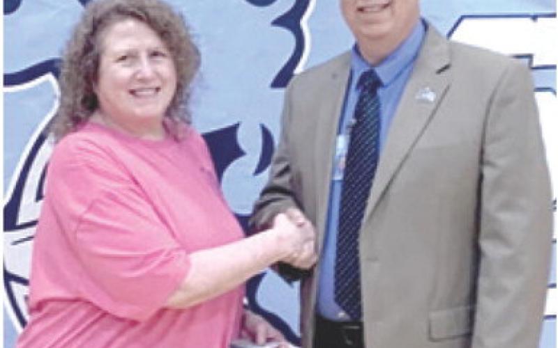 Ellen Harrington was recognized for 35 years of service with the Southeast school district by Superintendent Dr. Brad Miner.