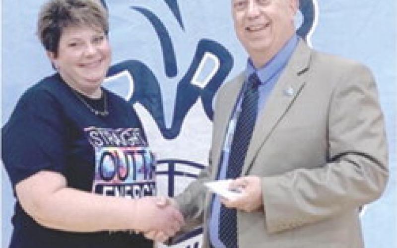 Dina Horgan was recognized for 20 years of service with the Southeast school district by Superintendent Dr. Brad Miner.