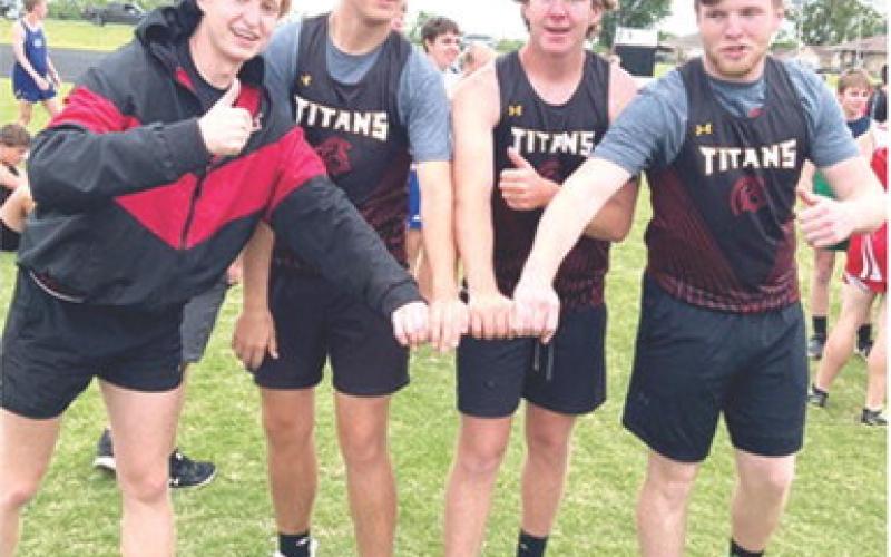 Titan Junior, Gavin DePratt and seniors, Jonah Smith, Kyler Rahmeier, and Brandon Stice stepped out of the field and onto the track to take first place with a time of 50.6 seconds in the 400 Meter Throwers Relay at the Northeast High School Track and Field Meet, Tuesday, in Arma. The CUHS Athletes normally compete in field events but took to the track for the special race specifically for them. Complete results can be found on page 7 of today’s News-Report. Courtesy photo.