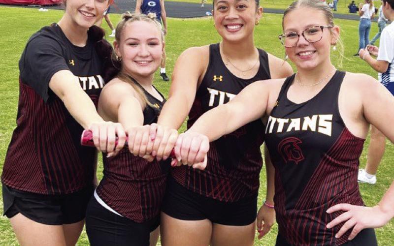 Lady Titan “Throwers” placed first in a race designed for athletes who normally compete in field events only, in the Northeast Track and Field Meet, 400 Meter Throwers Relay, Tuesday, in Arma. Junior, Piper Hayes; sophomore, Amory Neely; junior, Trinity Adoremos; and freshman, Audrey Combs ran a time of 64.65 seconds to bring home the gold. Complete results can be found on page seven of today’s News-Report. Courtesy photo.