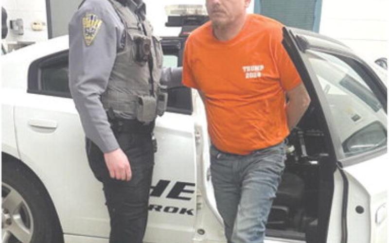 Sheriff’s Deputy Evan Duckett escorts Brian Stewart into the Cherokee County Jail after Stewart was found guilty of sex crimes.