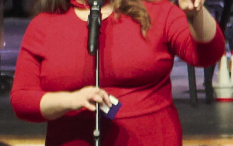 Stacey Strubel, director of choir and theatre directed the Columbus High School Choir during the annual Christmas Concert held December 19.