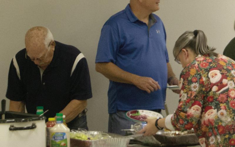 Lions Club members from around the area gathered to celebrate Christmas with a catered dinner recently.