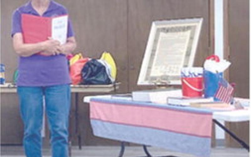 At a monthly meeting of the Sheridan Homemakers, 4-H members had the opportunity to practice giving presentations on their Cherokee County Fair entries. Each presenter was given a backpack of useful items to use during fair week. Prior to the 4-H presentations, Sheridan Homemaker Treasurer, Evon Goettel, gave a talk on the history of the United States Constitution. Members participated in a pop quiz and Tara Underwood won a prize for the highest score. Courtesy photo.
