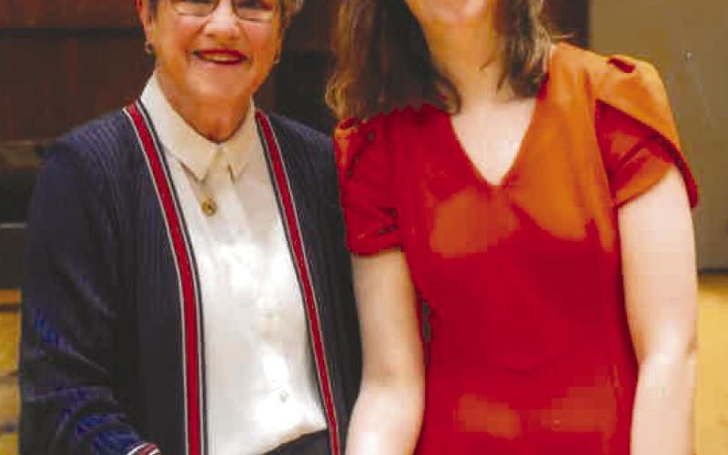 Kansas Governor Laura Kelly congratulates Riverton High School graduate Bethany Hilderbrand on being a 2025 Kansas Governror’s Scholar. Courtesy photo.