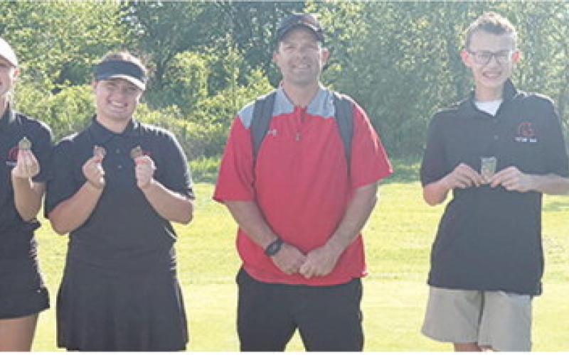 The Columbus Junior High School Golf Team placed third in the Caney Middle School Golf Tournament, Thursday at the Caney Golf Club. Lady Titans, Cali Carpino, Fallon Smiley, and Tyler Kirk place in the top ten individually to pick up two medals at the end of the day. Team members are: Addison Johnson, Tyler Kirk, Cali Carpino, Fallon Smiley, Coach Jerry Smiley, Cooper Grundy, Jax Hale, and Keegan Blackledge. Courtesy photo.