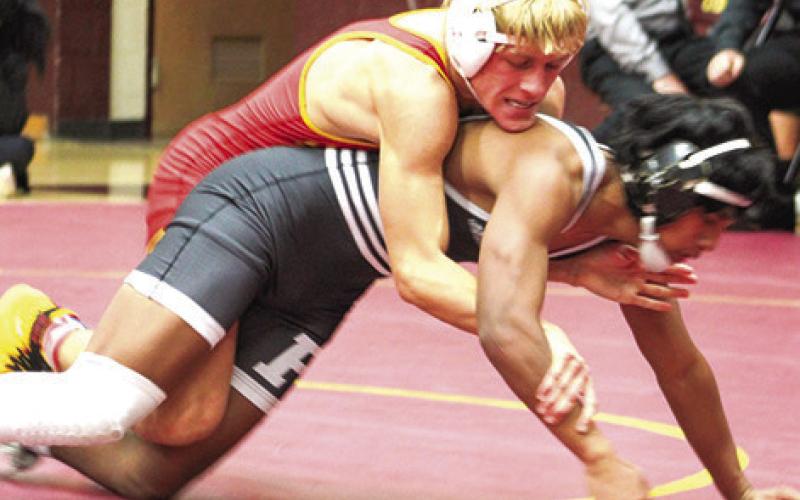 Titan Senior, Cade Saporito, has the upper hand on his Frontenac opponent, Jomar Pero, getting a win by fall in the double dual at Girard, Thursday. Frontenac outlasted the Titans, 46-34, in team scoring, but Columbus knocked off their hosts, 42-30. Cade beat Bryce Reece by fall in the Girard dual.
