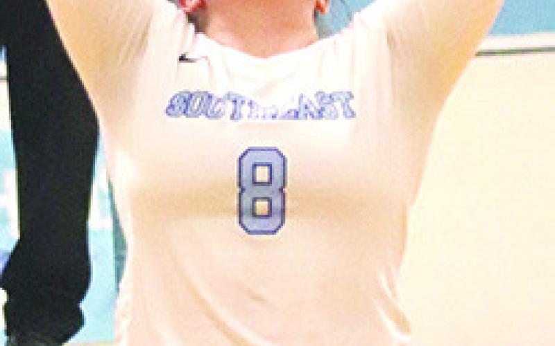 Senior, Natalie Wells, set up her team mates for 25 assists to help win two matches on the opening night of league play at Southeast High School, Tuesday. Photo by Southeast High School Yearbook Staff.