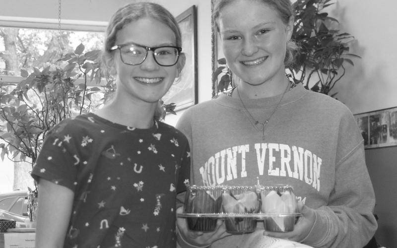 Cherokee County 4-H members recently delivered homemade treats to area businesses to show their appreciation. Ryleigh Holmes and Reagan Holmes with Glittering Stones club were among those delivering.