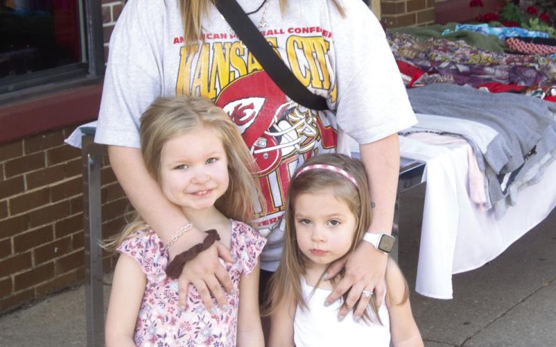 Attending the Columbus High School Homecoming parade were Claudia, Ariana and Gloria Martocei. They were part of the large crowd awaiting the parade to start.