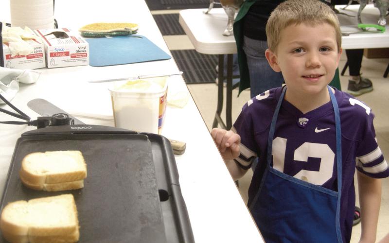 As the Easter Holiday season nears, and with the beginning of lent, the annual Saint Bridget’s Catholic Church Friday Fish Fry was held in the Scammon Parish Hall. Some folks who don’t eat fish such as Luke Holden go for the grilled cheese sandwiches and a side or two.