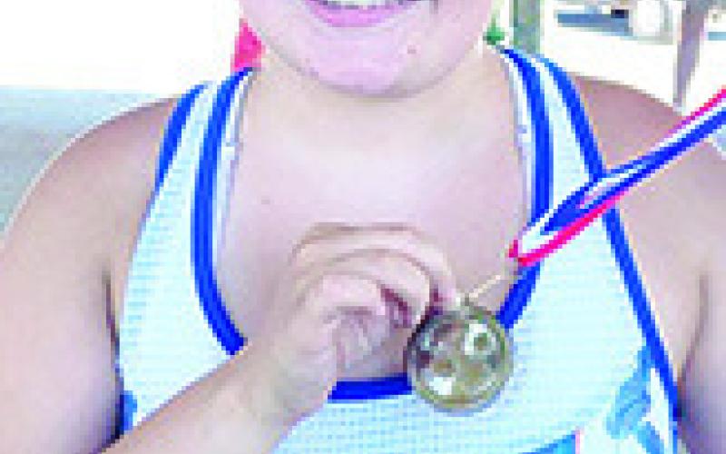 Amory Neely took second place the girls 15 and over age division and Easton Long placed fourth in the boys 15 and over age group in the final tournament for the Columbus Junior Golf Program, Thursday, in Coffeyville. Courtesy photos.