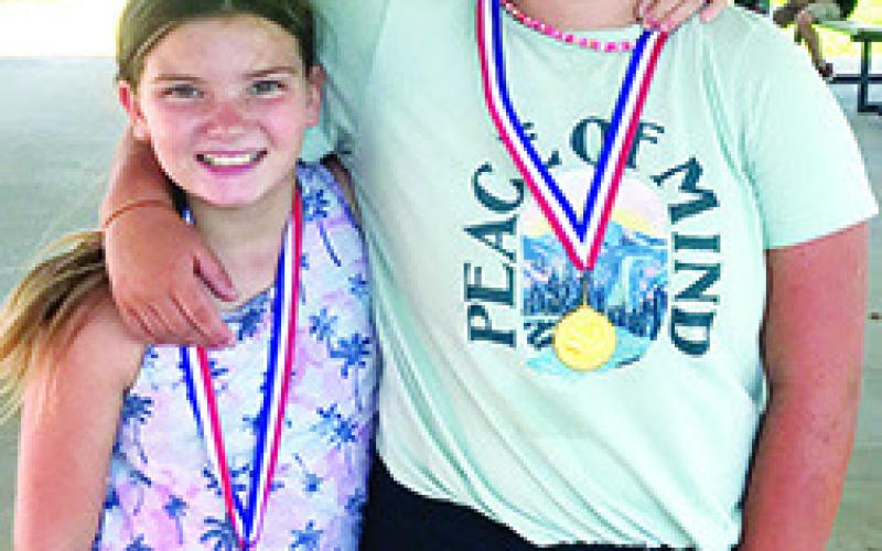 Alaina Smiley placed third in the 9-11 year-old girls division and Fallon Smiley was first in the 12-14 age group in the Columbus Junior Golf Program finale, Thursday, in Coffeyville. Courtesy photo.