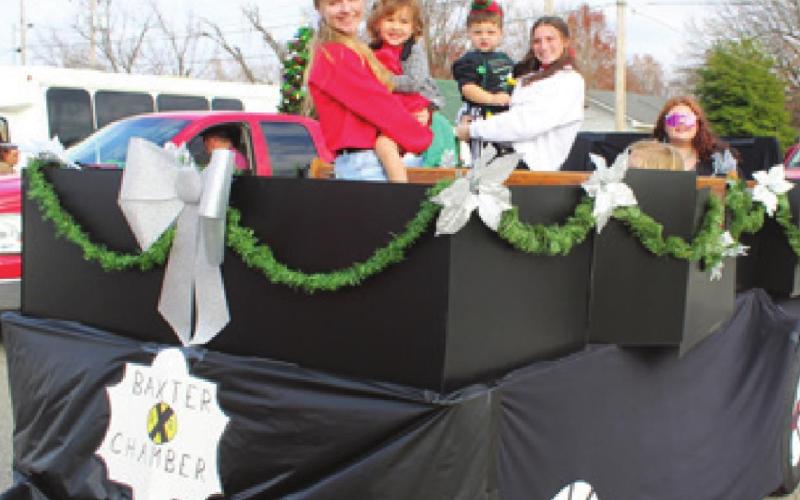 The Chamber of Commerce Little Mister and Miss Holiday float placed second in the civic float category.