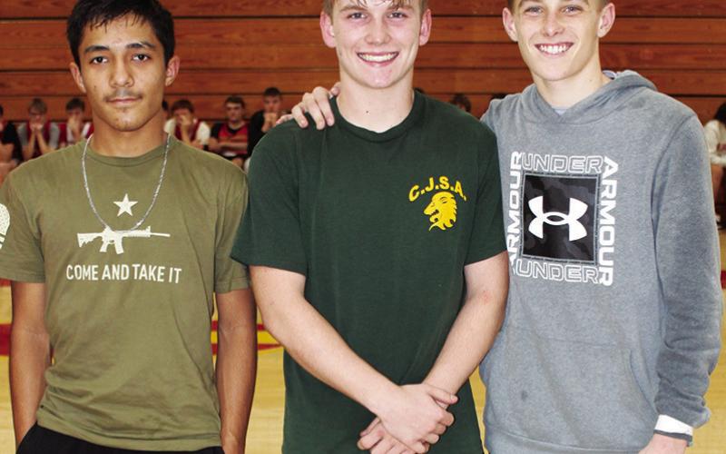 Sophomore members of the Titan Wrestling Team were introduced during the Meet the Titans Night at the CUHS Gym, November 28. Langstyn Arther-Soliven, Syler Schuberger, and Korbyn Newberry.