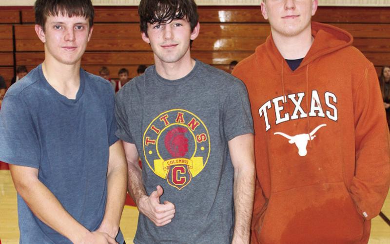 Junior members of the Titan Wrestling Team were introduced during the Meet the Titans Night at the Columbus Unified High School Gymnasium, November 28. Dallas Scott, River Sargent, Mason Hopkins.