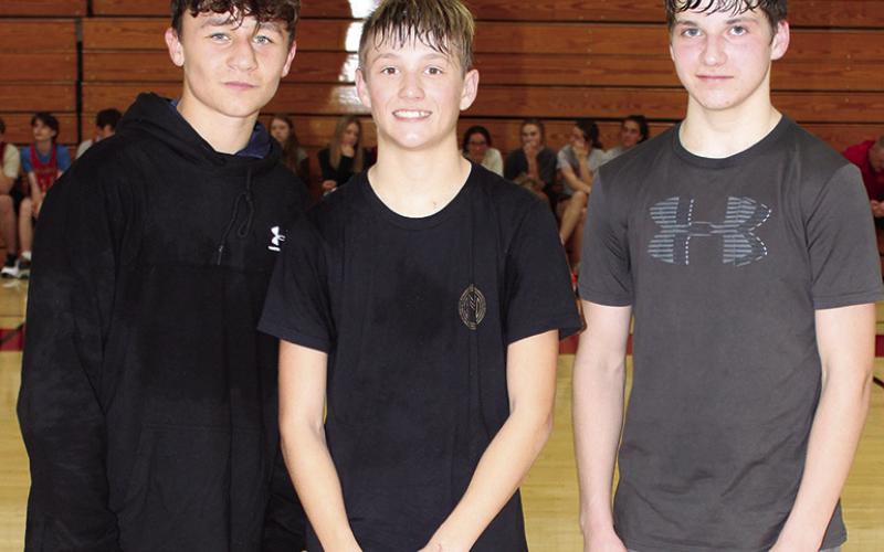 Freshmen members of the Titan Wrestling Team were introduced during the Meet the Titans Night at the Columbus Unified High School Gymnasium, November 28. Jayden Rodriguez, Cal Saporito, and Dalton Nading.