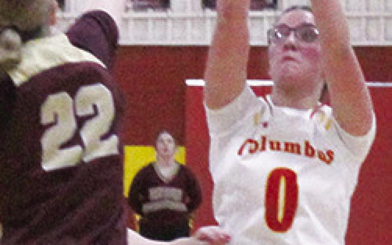 Lady Titan Sophomore, Katy Mooney, pumped in 22 points in the 45-42 win over the St. Paul Lady Indians at the Columbus High School Gymnasium, Tuesday.