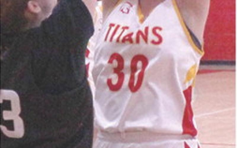 Lady Titan Seventh Grader, Temperance Goff, goes up for two points in a recent home game against Frontenac at the Central School Gymnasium. Temperance led Columbus with four points in their November 25 loss to Girard, 12-39, in their final home game of the season on the Central Court. The Lady Titans wrapped up their 2024 regular season schedule last night at Baxter Springs, They will play in the CCCJL Tournament, December 16 and 19 at Frontenac.