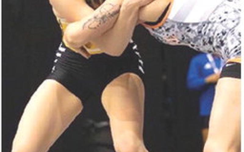Below: Addison Saporito, 2023 CUHS Graduate wrestling at the NAIA National Wrestling Championship Tournament, March 13 in Park City. Courtesy photo.