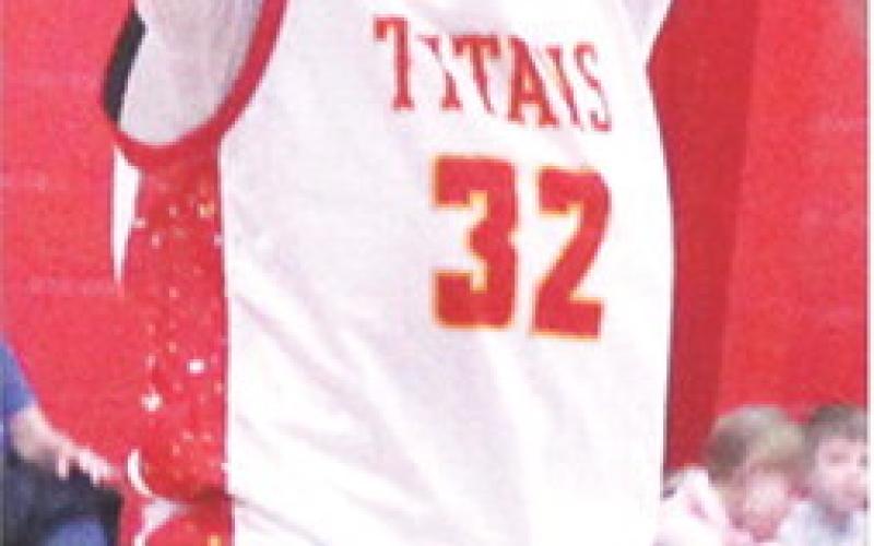 Josiah Palmer, Titan Freshman, goes up for a shot in the junior varsity loss to St. Mary’s-Colgan, 25-67, Friday, at the Central School Gymnasium.