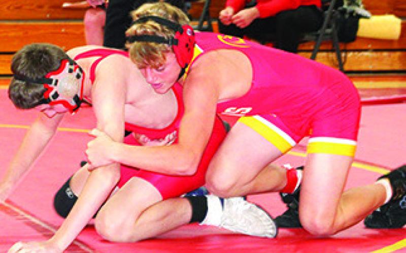 Jr. High Titan wrestling splits home double duels