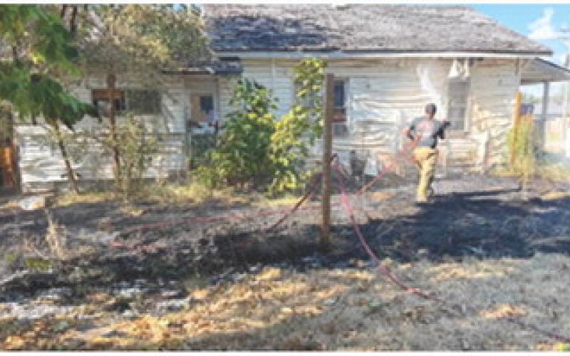 After a grass fire got out of hand due to the extremely hot and dry conditions it caused serious damage to the outside of a residence in Columbus. A burn ban was issued by the City of Columbus Thursday. Photo courtesy of Columbus Fire Department.