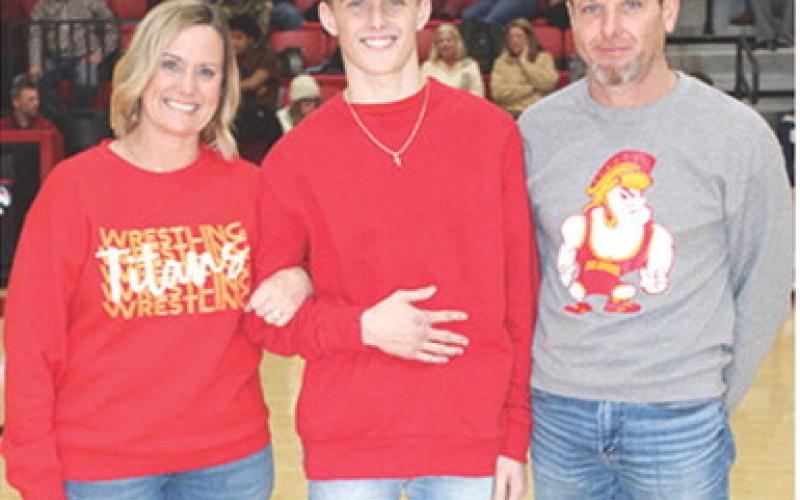 Titan Senior, Korbyn Newberry, was recognized during Senior Night Ceremonies, February 21, at the Columbus Unified High School Gymnasium. Korbyn is a four-year member of the Titan Wrestling Team. He was escorted by his parents, Tracie and Korey Newberry.