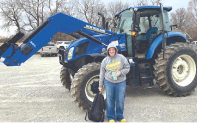 Addison Cook was one of the Columbus High School Future Farmers of America members who drove her tractor to school as part of FFA Week at CUHS. Courtesy photo.