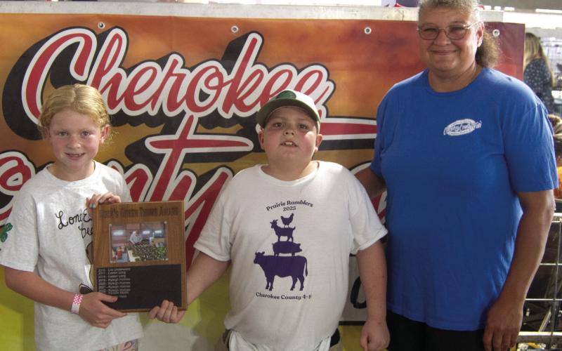 Adley Hess was awarded the Bucks Green Thumb Award during the awards ceremony held Saturday night of the fair. The award was presented by Fair King Titus Woods and Anne Sharp.