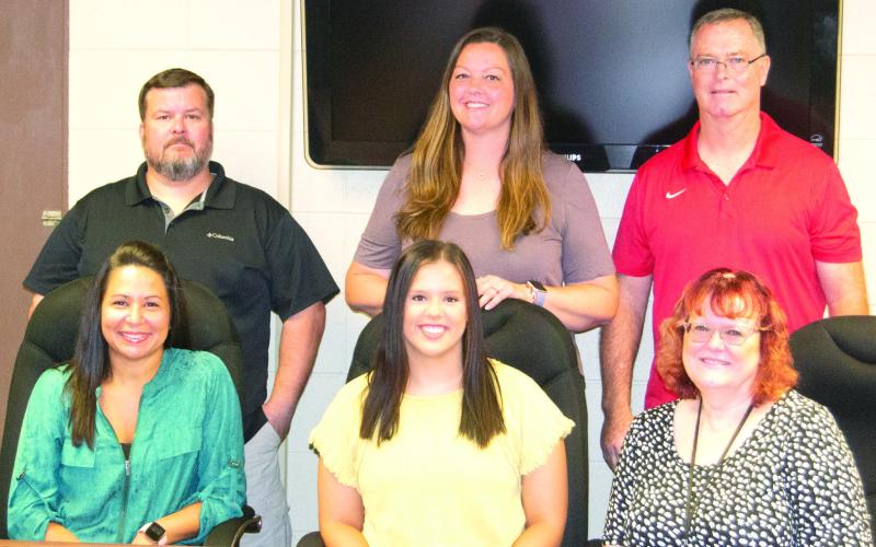 New teachers in the Columbus School District were welcomed to their new positions by Chamber of Commerce Secretary and News-Report publisher Larry Hiatt. The new teachers include (back row, l to r) Brian Walrod, Jesicca Harris, Michael Kipp, (front row) Veronica Long, Sidnee Donaldson and Jackie Allmendinger.