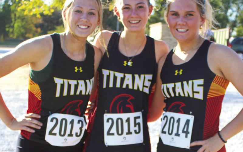 Lady Titans Cara Atlis, sophomore, Darcy Garett, senior, and Kenadie Carter, senior, ran in the CNC League Cross Country Race at the Columbus Brush Creek Golf Course, Thursday.