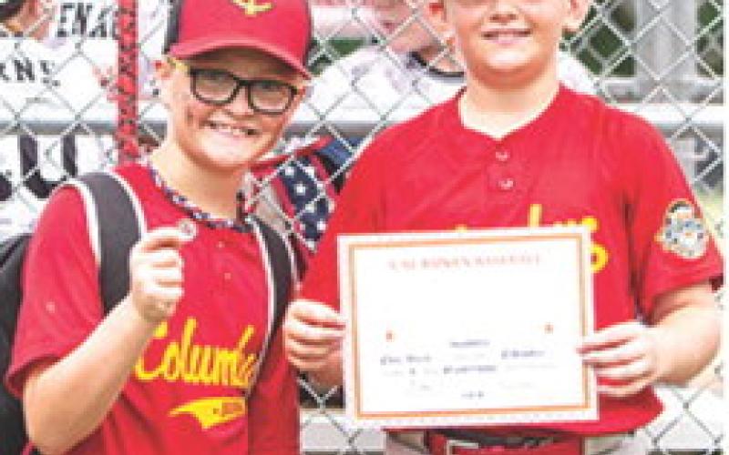Cruz Sharp received the WOW Award and Kolt Carter was named Most Valuable Player for the Columbus 10U Cal Ripken All-Stars in their District 5 Tournament win over Edna, 15-1, Saturday, at Parsons.