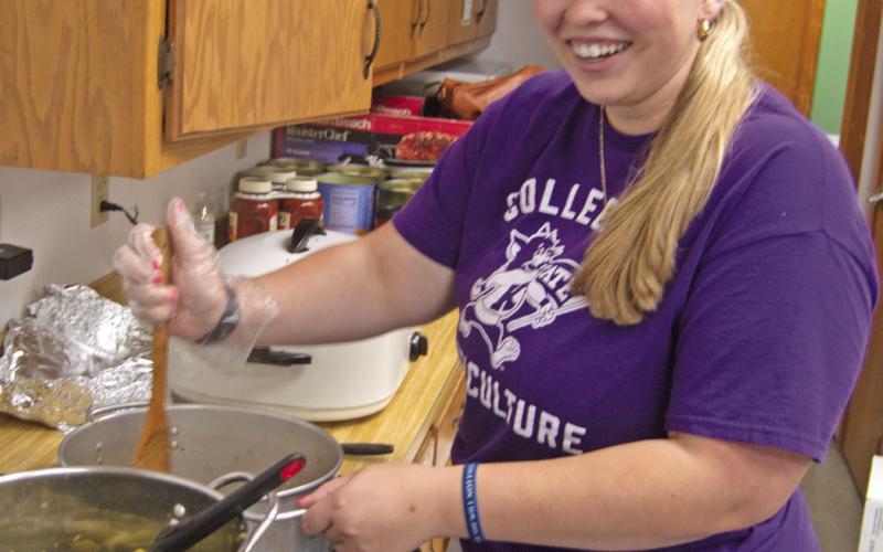 Emma Walker, Cherokee County 4-H member was just one of the youth helping with the spaghetti fundraiser recently. The clubs are making improvements and repairs to their facilities and will use the funds in their efforts.