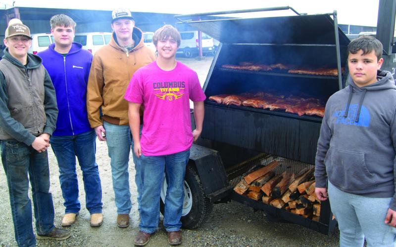 Columbus Titan football players and parents worked Saturday
