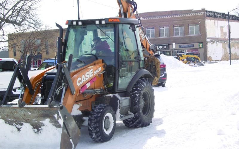 The road crews in the city had much of the snow off the roadways Wednesday. Despite the prediction of much more snow most folks think this was plenty.