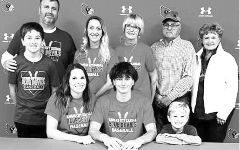 Cohen Epler, Webb City High School Senior, signed a National Letter of Intent to extend his baseball career with the Kansas City Kansas Community College Blue Devils. Members of his local family were on hand last fall for the official signing. Seated: Ashlee Epler, Cohen Epler, and Cru Epler. Standing: Conlin Epler, Charlie Epler, Lizzie Epler Roberts, Marilyn Epler,Tom Epler and Jane Ann Turner. Courtesy photo.