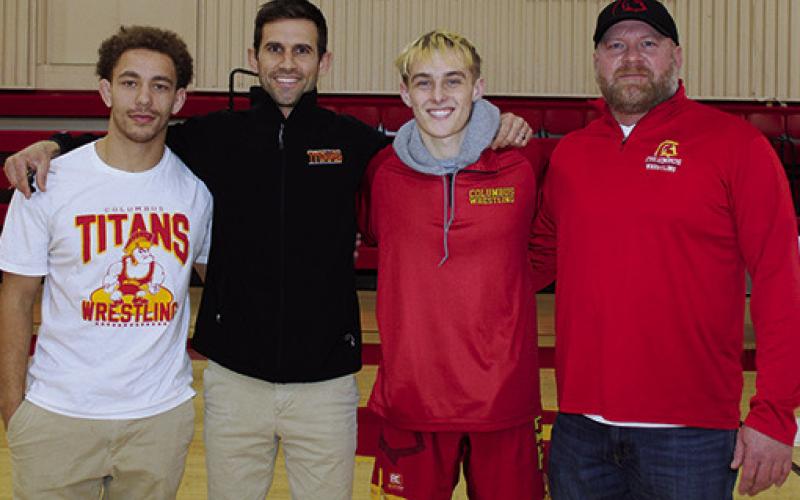 Titan Senior, Korbyn Newberry, was recognized during Senior Night Ceremonies at the dual with Labette County, Monday. Korbyn wrestles in the 120 weight class winning his match against the Grizzlies. He is ranked fifth in Class 4A by the Kansas Wrestling Coaches Association. He is pictured with his coaches, Zach Porter, Marcus Bowman, and Casey Garvin.