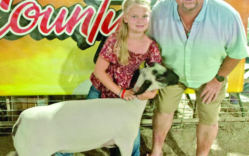 The Cherokee County 2024 Fair Grand Champion Sheep was shown by Kasyn Robinson of the Spring Valley Sparklers 4-H Club. The sheep brought $1,500 in the premium sale from Dr. Robert Herron Dental Centers. This is his 36 year of buying champion livestock at the fair. Kasyn is the daughter of Caleb and Megan Robinson.