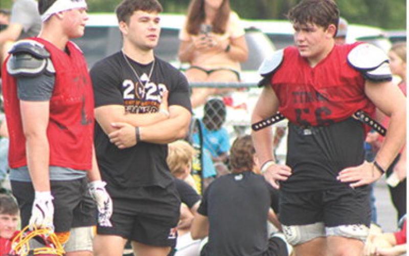 Sophomores, Jace Gaither and Kash Smith chat with Columbus Unified High School Alum, Gabe Martin during the Emporia State University Football Clinic held a the Central School Soccer Pitch, July 18. Gabe continued his football career at Baker University where he is a member of the Wildcat Team.