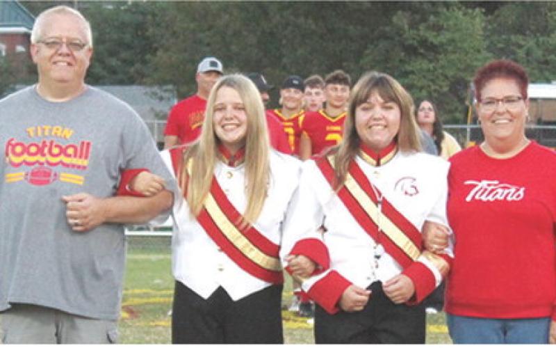 Titan Seniors, Morgan and Mackenzie Richards, were recognized during Senior Night Ceremonies, October 17, at Titan Stadium. Morgan is a four-year member of the Titan Band and the Lady Titan Volleyball Team. Mackenzie is a four-year member of the Titan Band and has been manager for the Lady Titan Volleyball Team four years. They were escorted by their parents Drew and Kim Richards.