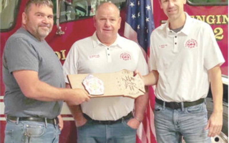Jason Allison, faithfully served the Columbus Fire Department for 33 years. Jason stepped down earlier this year. He was presented with a plaque to show the department’s appreciation for his decades of dedication and service. Assistant Chief Steve Burton and Chief Steven Burton presented the plaque. Photo courtesy Columbus Fire Department.