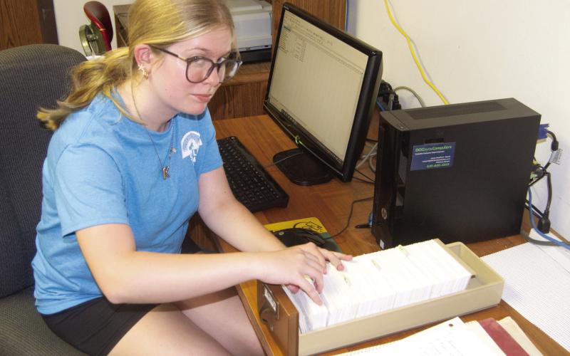 Riverton High School Junior Kaylee Knowlin is working as a volunteer at the Columbus Clione Bieber Genealogical Library of Family History during this summer. She is currently typing the obituary card catalog into the computer so the information will be online in the future.