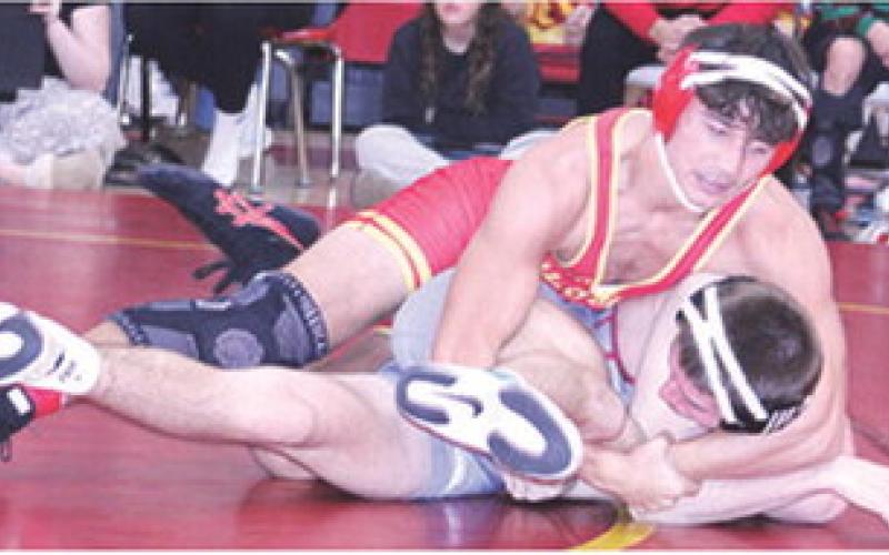 Titan Senior, Jayden Rodriguez, right, takes control, of his match, Saturday, in the 2025 Columbus Duals Tournament at the CUHS Gymnasium. Jayden won five matches by fall and one by forfeit to sweep the day and earn a win in the 157 pound weight class.